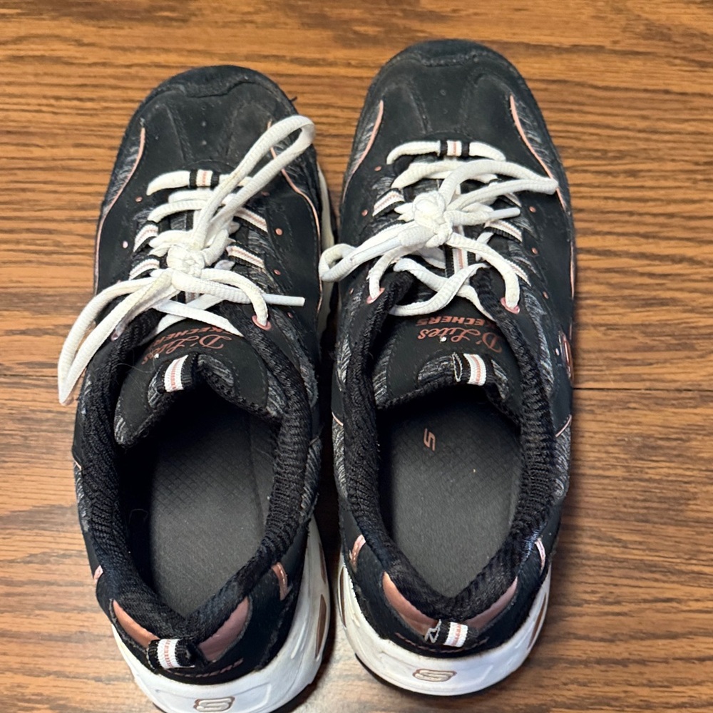 Skechers Woman’s Black Sneakers with Pink Accents in size 9 US